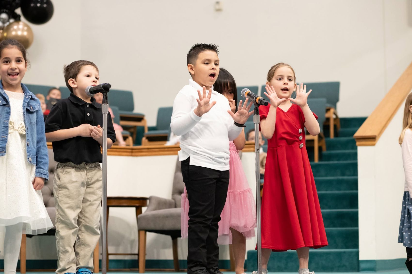 Young students performing in a school program